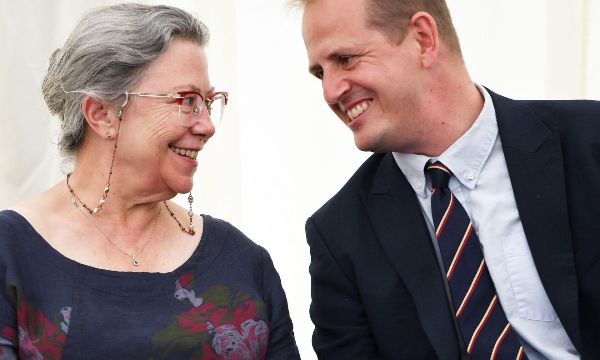 Chair of Governors, Karen Gilmore and Deputy Head Robert Newman smile for a picture.