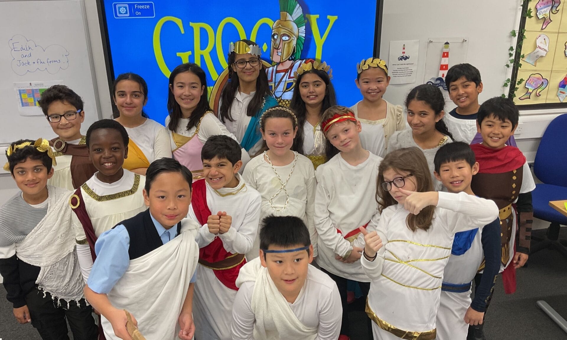Year 6, dressed in togas, celebrate their Ancient Greek enrichment day.