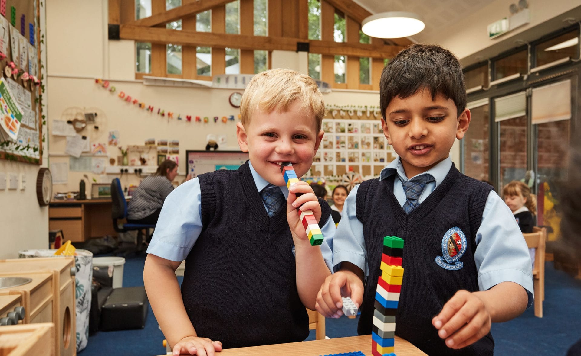 Two Nursery boys play with lego in one of the Annexe classrooms.