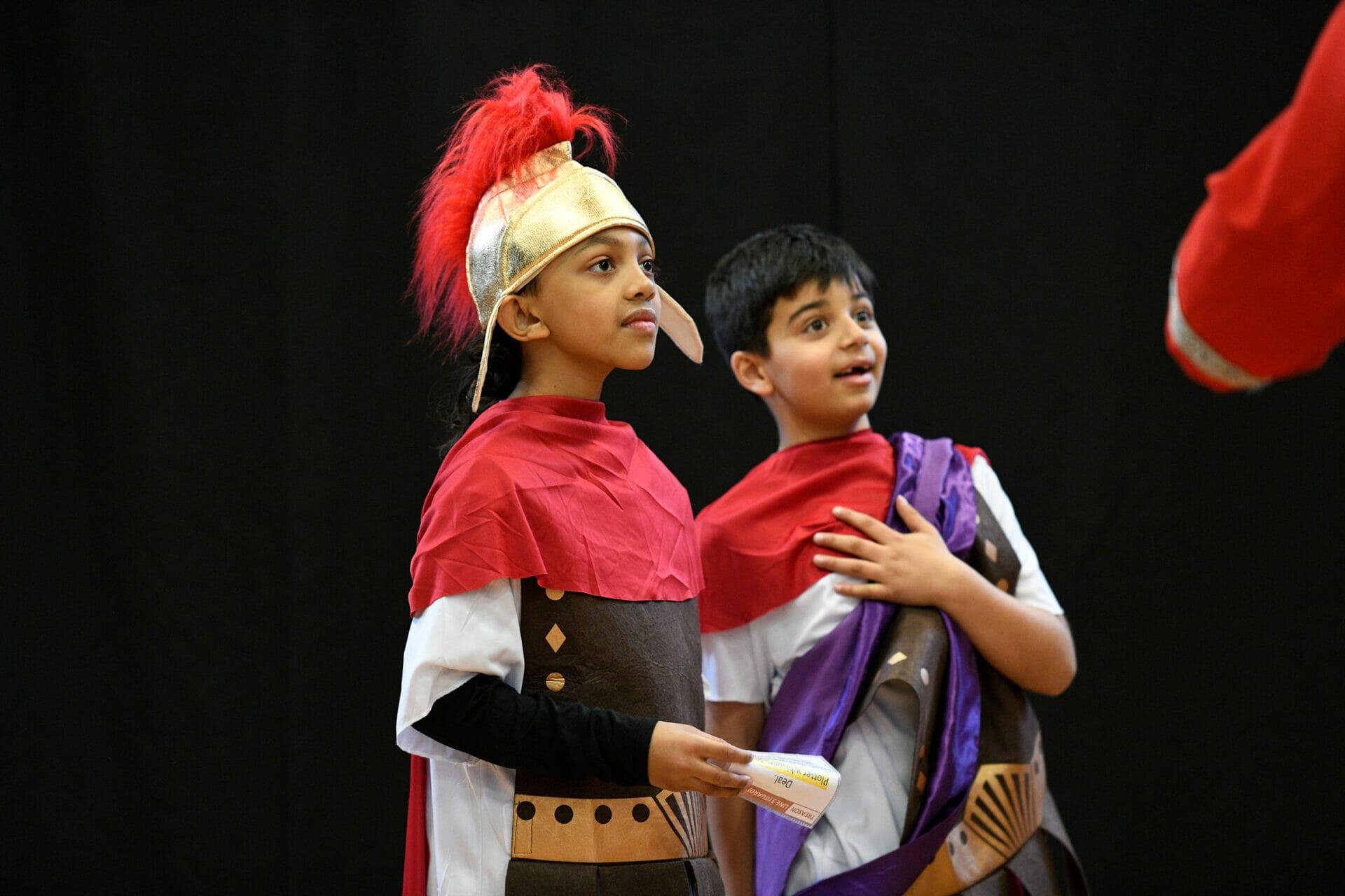 A boy is dressed up as a Roman Soldier for an enrichment day.